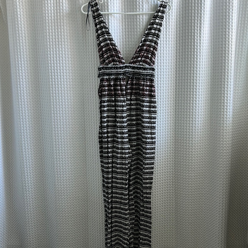 Forever 21 jumpsuit. Open front/back, with keyhole feature